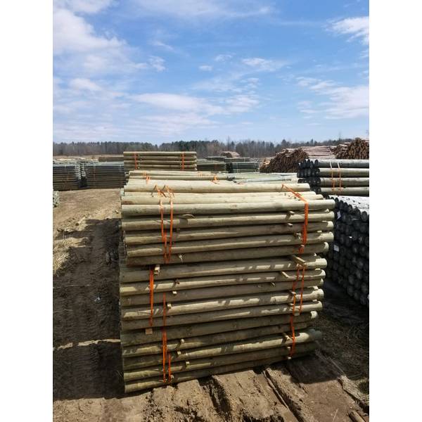 Photo of 3-1/2"x7' Round Wood Fence Post CCA