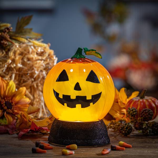 Photo of 7 in. Illuminating Spinning Pumpkin Water Globe