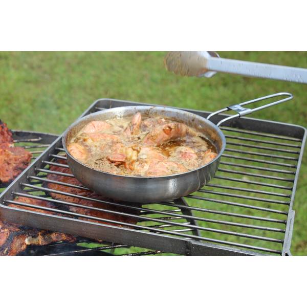 Outdoor cooking fun with long handled roasting and frying pans