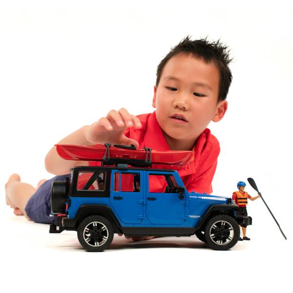 Bruder Jeep Wrangler Rubicon Unlimited with Kayak and Figure