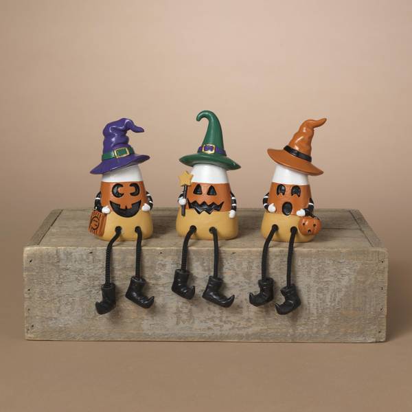 Photo of 7" Assorted Resin Halloween Candy Corn Shelf Sitters
