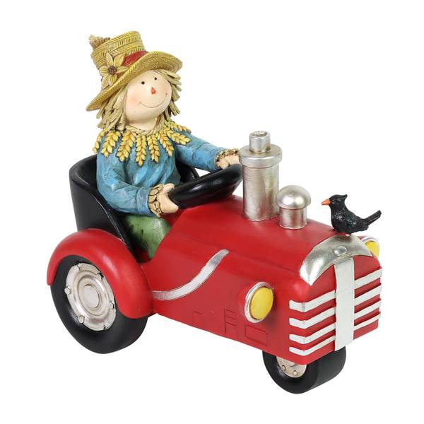 Photo of Scarecrow with LED Pumpkin on Tractor