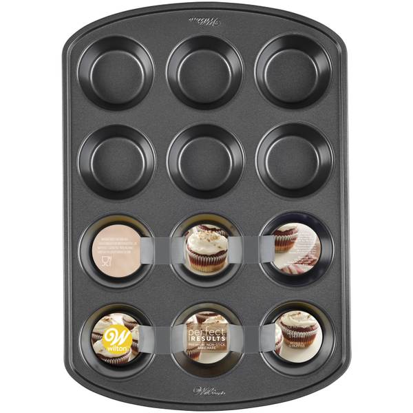 Wilton Perfect Results 15 x 10 1/2 12-Compartment Non-Stick Steel Muffin  / Cupcake Pan - 2 x 1 1/4 Cavities 191002982